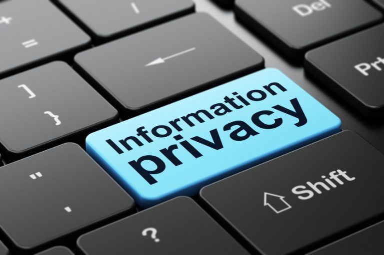 Information Privacy on computer keyboard background