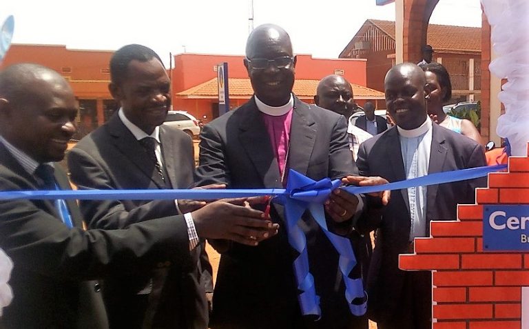 Bunyoro Kitara Diocese Bishop Nathan Kyamanywa while launching the Cente Home loan on friday (1) (1)