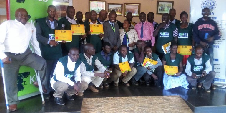 small and medium enterprise persons posing for a photo with with KCB officials after the training (1)