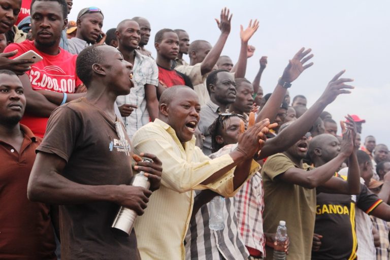 A section of excited fans at the Kyabazinga Stadium during the opening game