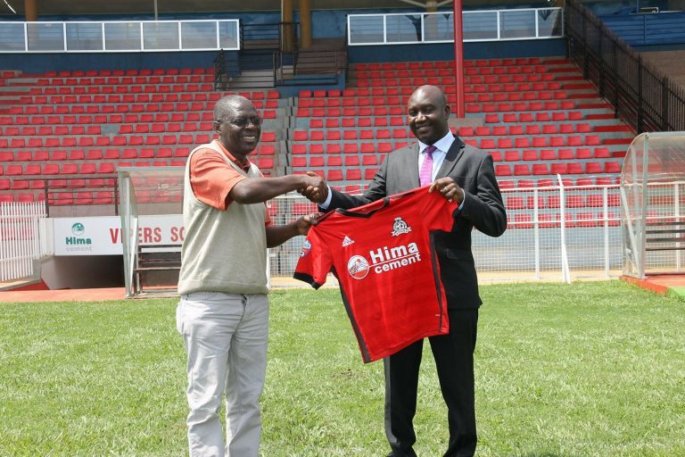 Mulindwa, the proprietor of Vipers SC unveils the technical director Eddie Butindo at St Mary's stadium