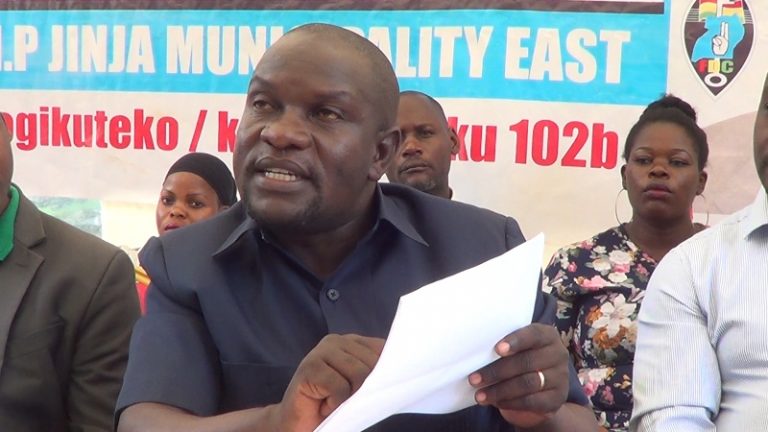 MWIRU-PAUL-DISPLAYING-A-LIST-OF-GHOST-NAMES-THAT-WERE-TRANSRED-ON-JINJA-EAST-REGISTER