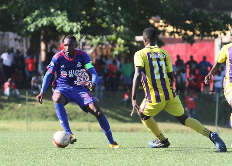 Iron man Tadeo Lwanga of Vipers in action against Proline. Vipers are running away with the trophy