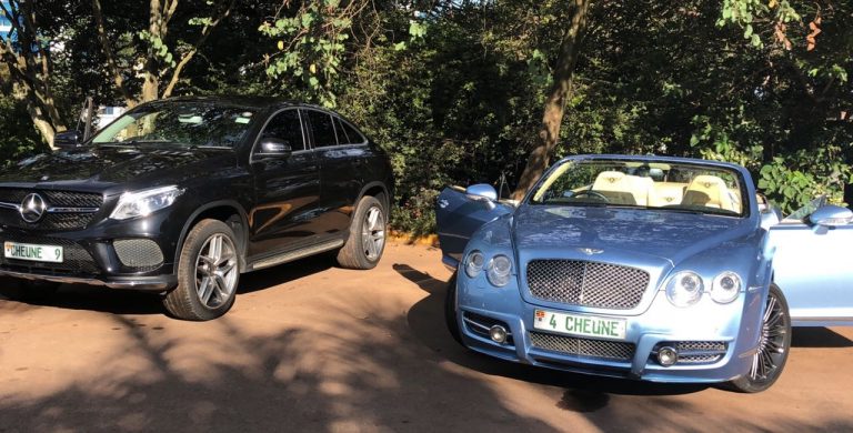Cheune's black mercedes parked at Serena besides his Bentley