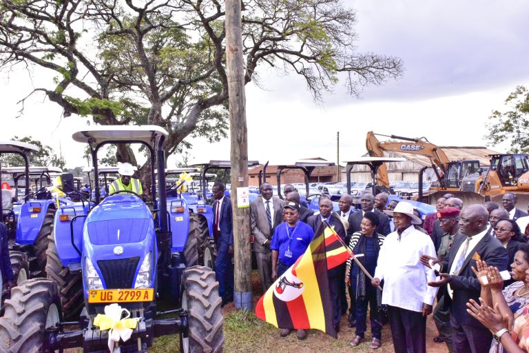 President Museveni hands over the New Holland tractors at NAmalere Agricultural Farm in Wakiso district on Thursday