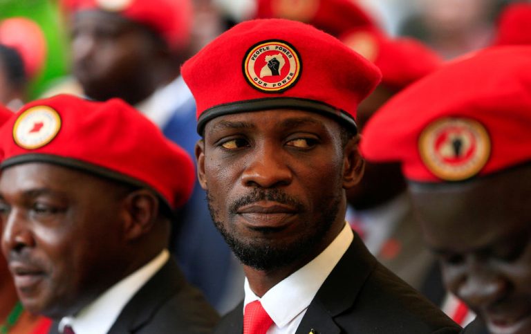 Ugandan musician turned politician, Robert Kyagulanyi also known as Bobi Wine attends a news conference at his home in Kasangati, Kampala