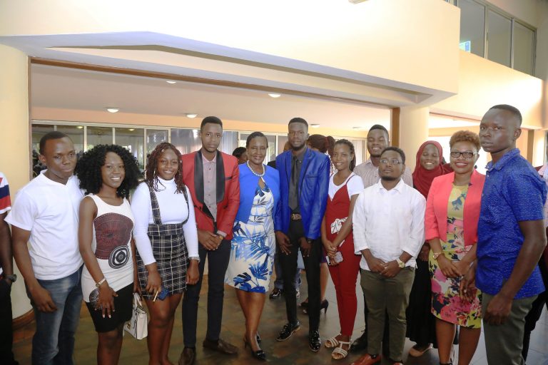 Hon Amelia Kyambadde (C) and TradeMark East Africa Senior Programs Manager - Damali Ssali (2nd R) joined by members of Makerere University Gavel Club at the Africa Contiental Free Trade Area Workshop.