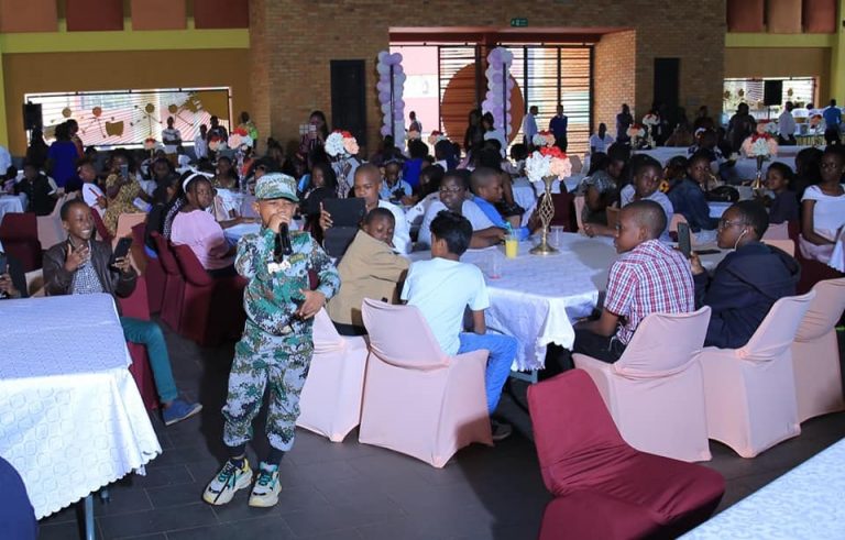 Fresh Kid, who is also a pupil at KPS entertaining guests