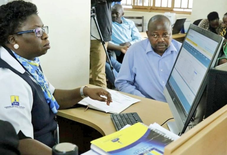 Akol serving John Bulega Ssalongo, a teacher and businessman