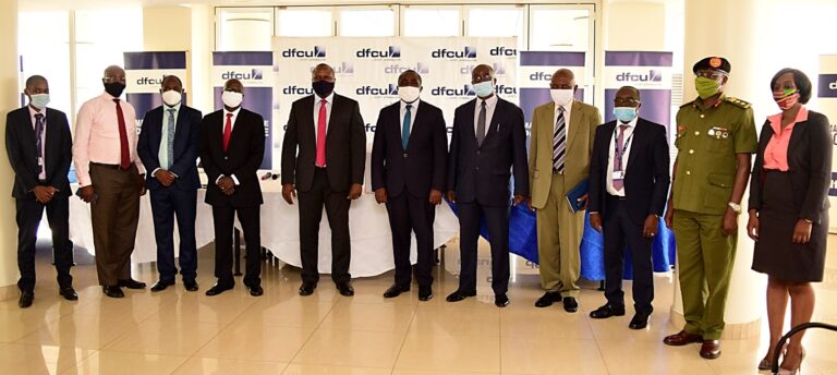 Representantives of dfcu Bank, Ministry of Defence and Veterans Affairs SACCO during the handover