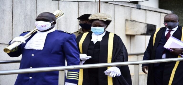 Speaker Rebecca Kadaga (C)