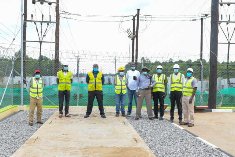 Umeme Managing Director Selestino Babungi inspecting the over sh7b new Tororo rural access line built recently