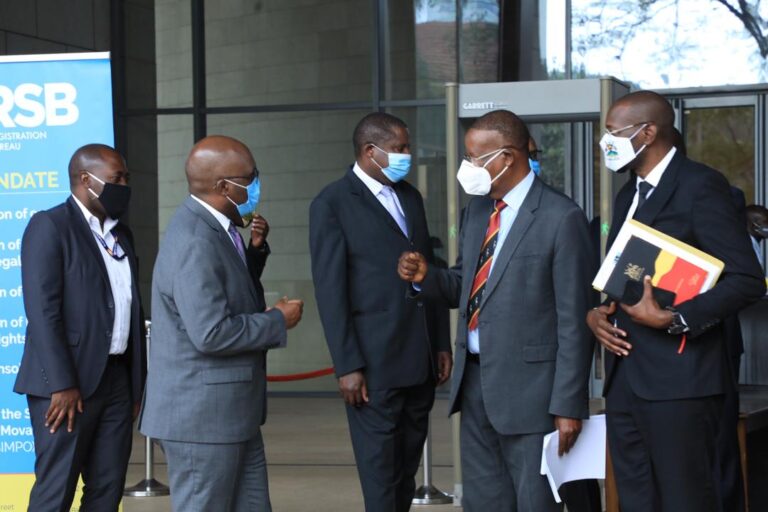 Registrar General, Bemanya Twebaze (2nd L) welcomes Prof. Ephraim Kamuntu, Minister of Justice & Constitutional Affairs and Deputy Attorney General, Hon. Jackson Kafuuzi at the National IP