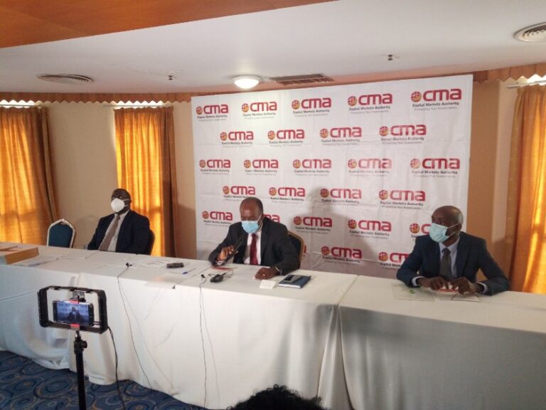 Keith Kalyegira (C) , the CMA CEO addressing the press