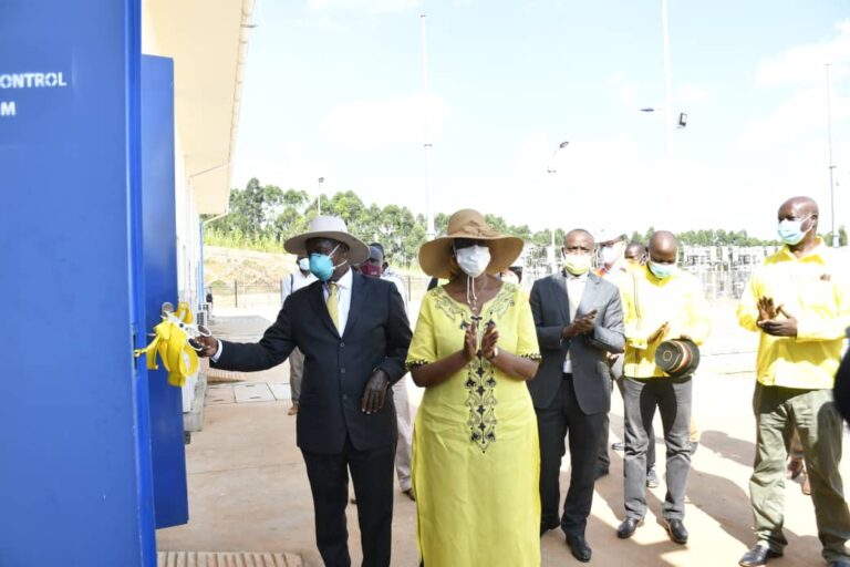 President Yoweri Museveni cuts a ribbon to officially launch the new Mukono North substation