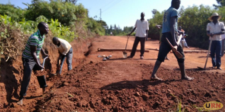 Residents working on 16.2kms road