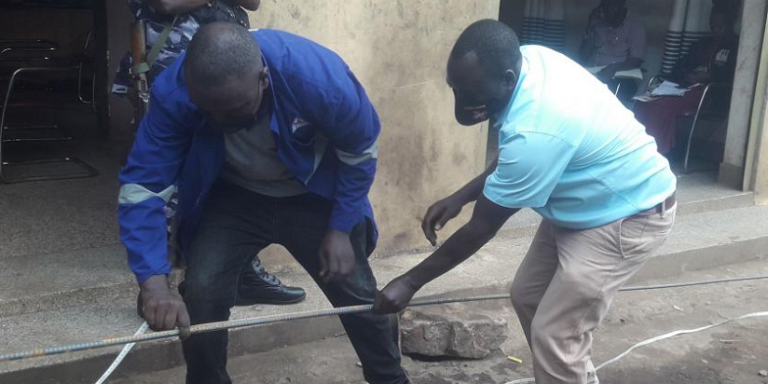 UNBS officials measure length of iron bars