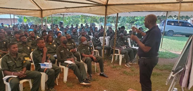 Bashaasha lecturing to the attentive youth leaders on Sunday