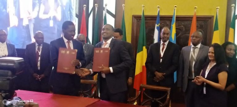 Agriculture Minister, Frank Tumwebaze (R) with Peter Munya, Kenya’s Cabinet Secretary, Ministry of Agriculture, Livestock, Fisheries and Cooperatives with Declaration of the G25 African Coffee Summit