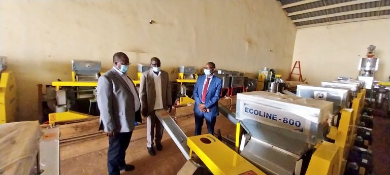 Minister Bwino, Robert Mwesigye-Technical Extension Manager at UCDA and UCDA MD, Emmanuel Iyamulemye