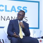 Julius Kakeeto, the PostBank CEO speaking to partcipants