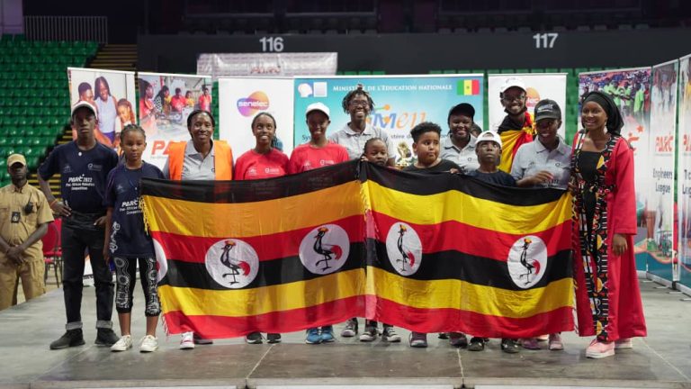 Team Uganda display the Ugandan flags at Dakar arean in senegal on Sunday