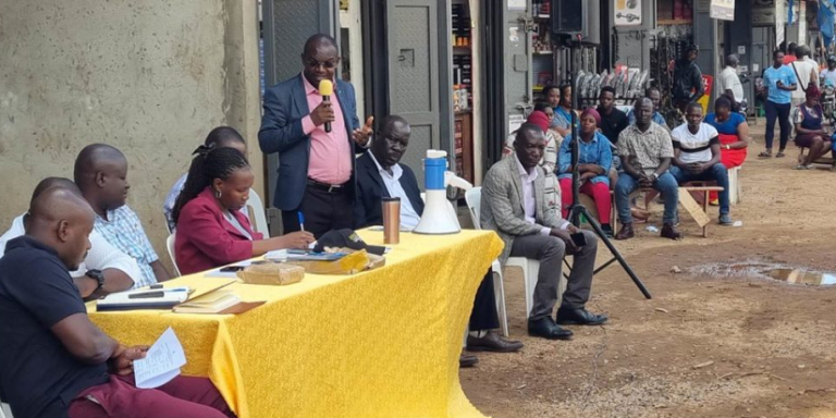 URA officials engaging Kiseka traders