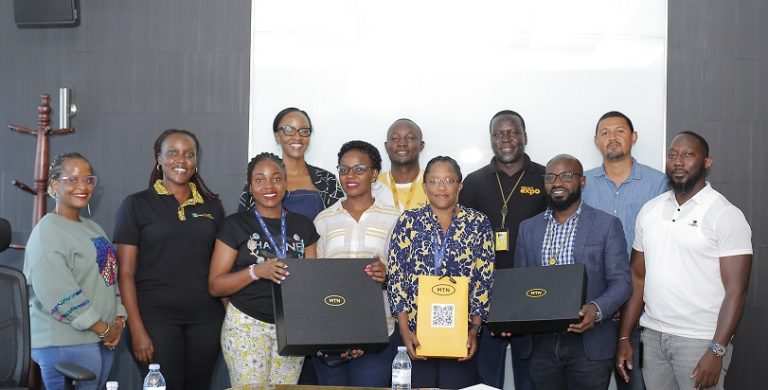 The MTN Uganda Team delivered a token of appreciation to Kiiza (Front row 3R)