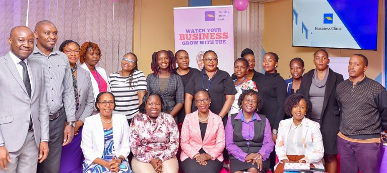 Peace Ayebazibwe (Extreme Left front row) poses for a group photo at the launch of the HFB Business Clinic