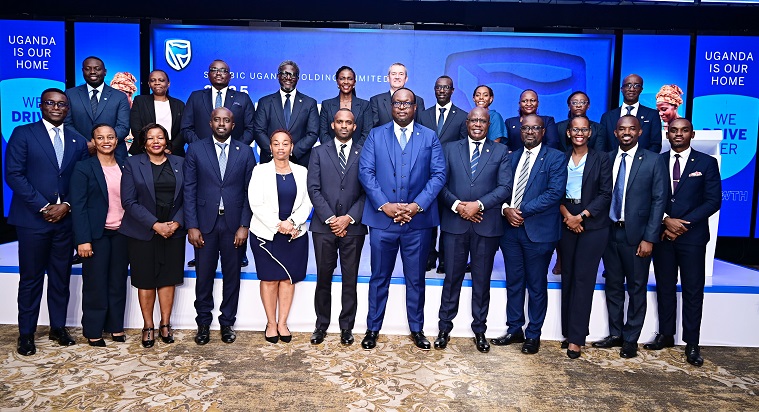 Stanbic Uganda Holdings Limited top leadership led by the Chief Executive Francis Karuhanga pose for the group photo during the results release ceremony at Sheraton Hotel in Kampala