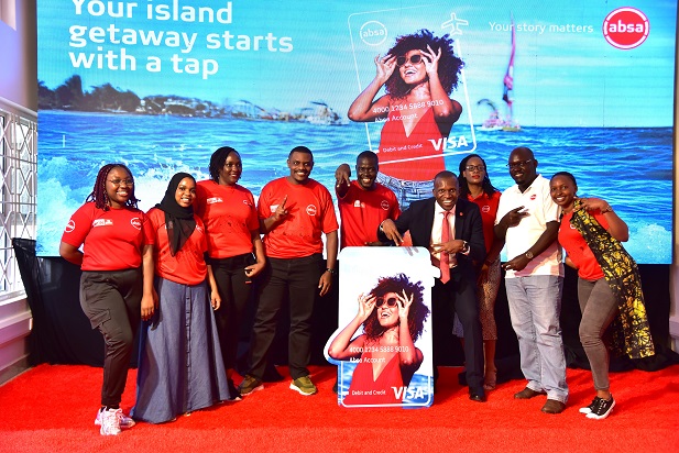 Absa Retail and Business Banking Director, Moses Rutahigwa with staff at the Launch of the Island Escape Campaign that reward Absa Card Usage